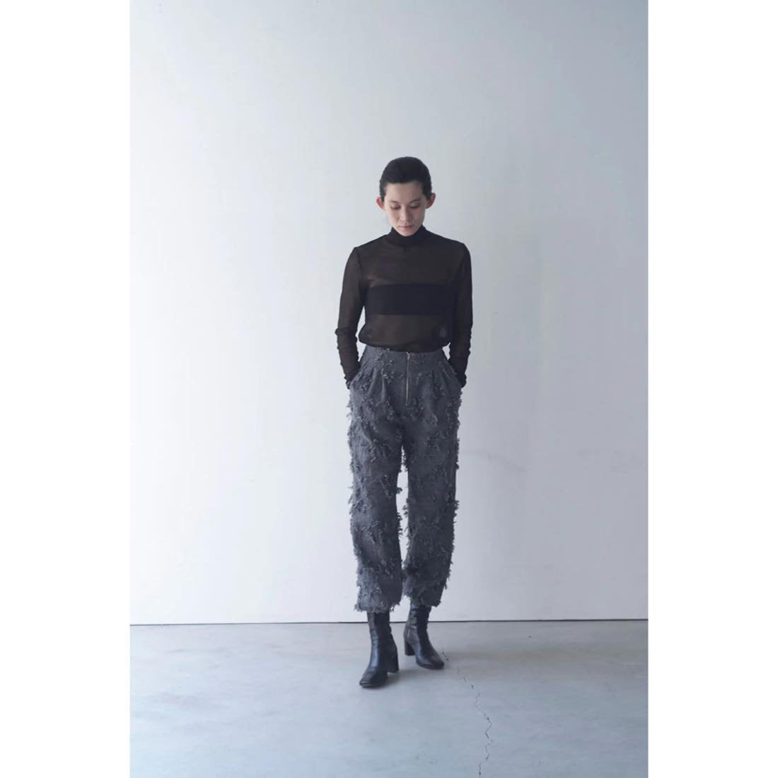 ERiKOKATORi / ripped wool pants